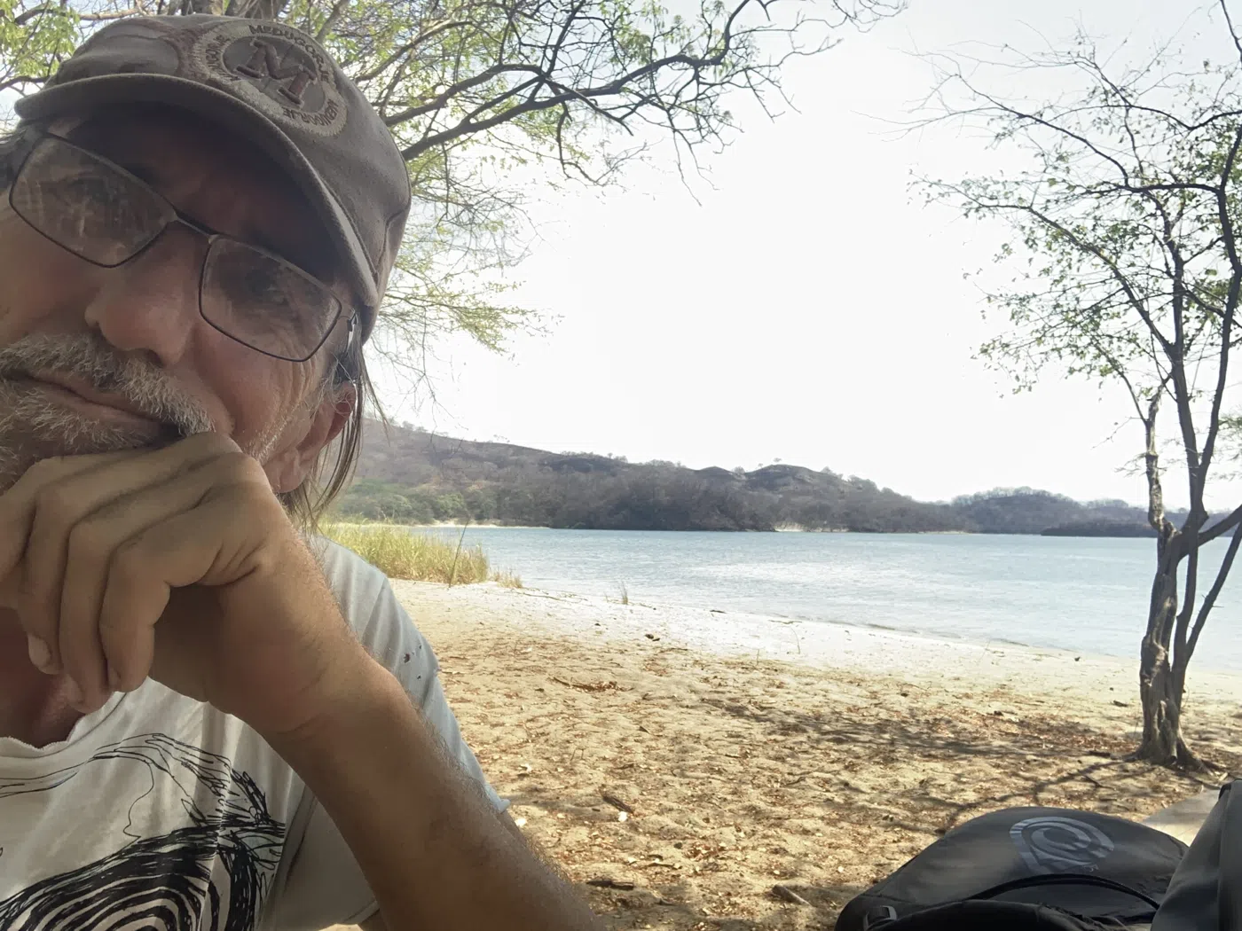 Duncan beside the water in the original Django Travels homepage photograph
